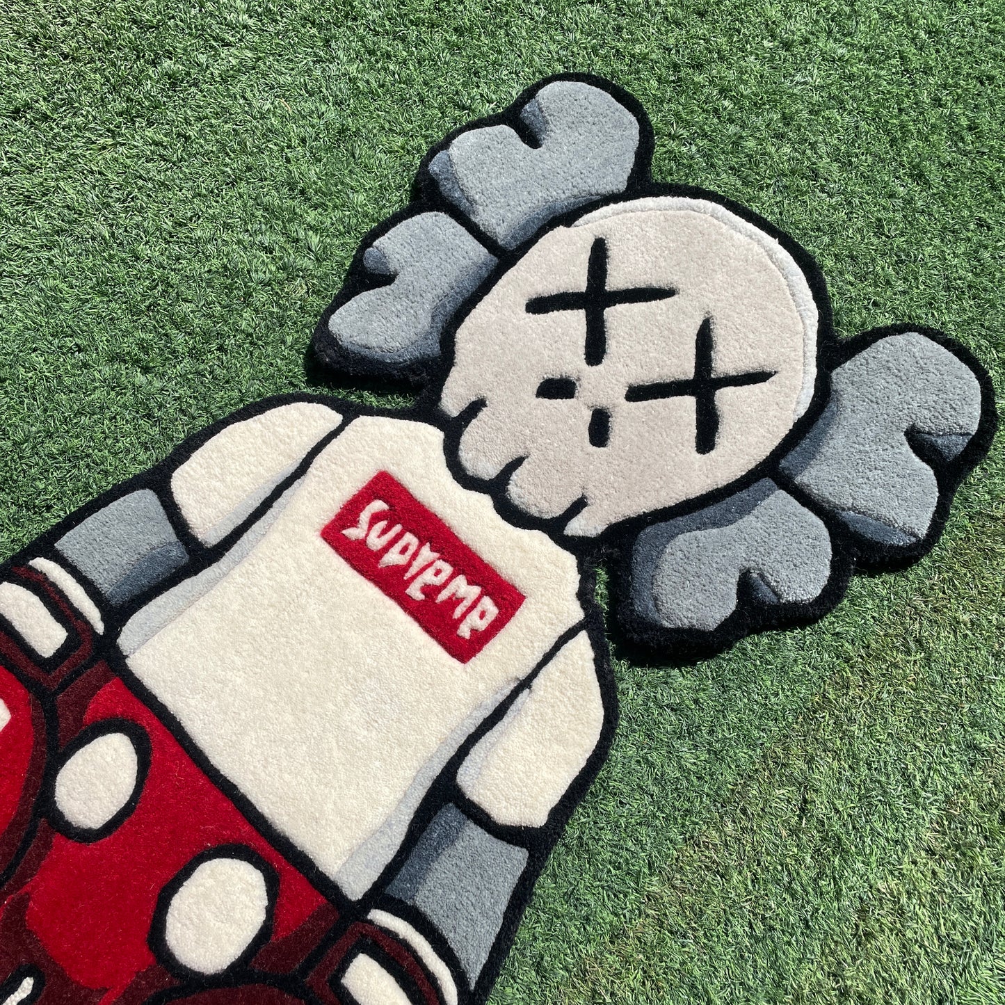 KAWS X SUPREME FIGURE RUG