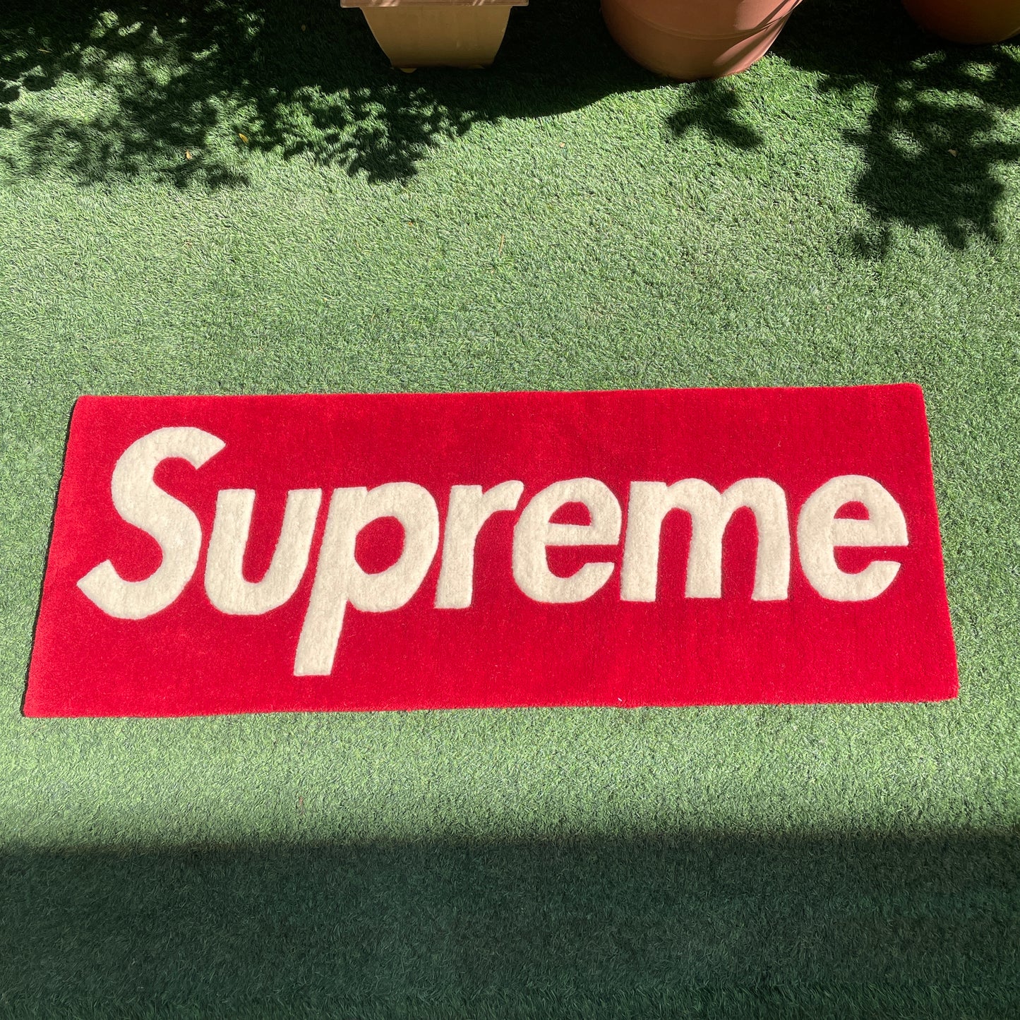 SUPREME RUG